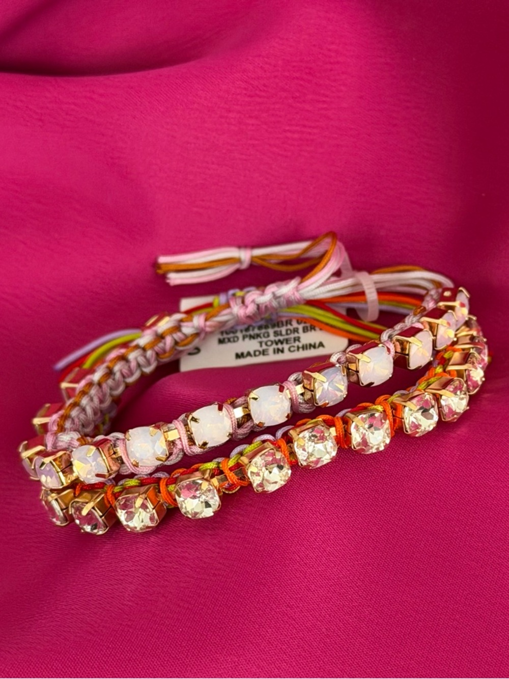 Set of two stackable Pink, Orange and Gold Tone Bedazzled Slider Bracelets. NWT